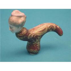 A 19th century Continental porcelain cane...