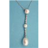 Image 1 : A cultured pearl and diamond pendant...