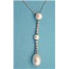 Image 1 : A cultured pearl and diamond pendant...