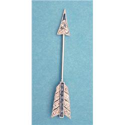 An Art Deco white gold arrow shaped jabot...