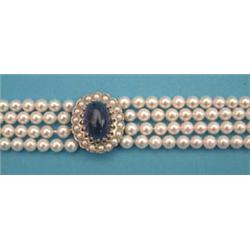 A 4 row cultured pearl choker necklace, the...