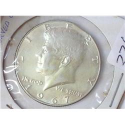 ERROR CURVED CLIP 1967 KENNEDY HALF DOLLAR