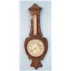 Image 1 : An Art Nouveau inlaid mahogany aneroid...