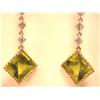 Image 1 : 14kw Gold Earrings with Diamonds and Peridot