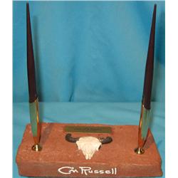 Desk pen set on brick from C. M. Russell’s house in Great Falls & accompanying  pamphlet, ca 1960’s.