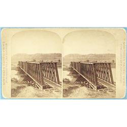 Stereo card, Haynes, F. J., Billings Bridge, Yellowstone River, 1880’s.