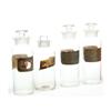Image 1 : FOUR GLASS APOTHECARY JARS.