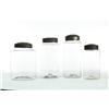 Image 1 : FOUR BLOWN GLASS STORAGE JARS WITH TIN LIDS