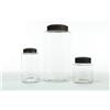 Image 1 : THREE GLASS STORAGE JARS WITH TIN LIDS.