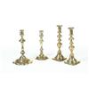 Image 1 : FOUR BRASS CANDLESTICKS.