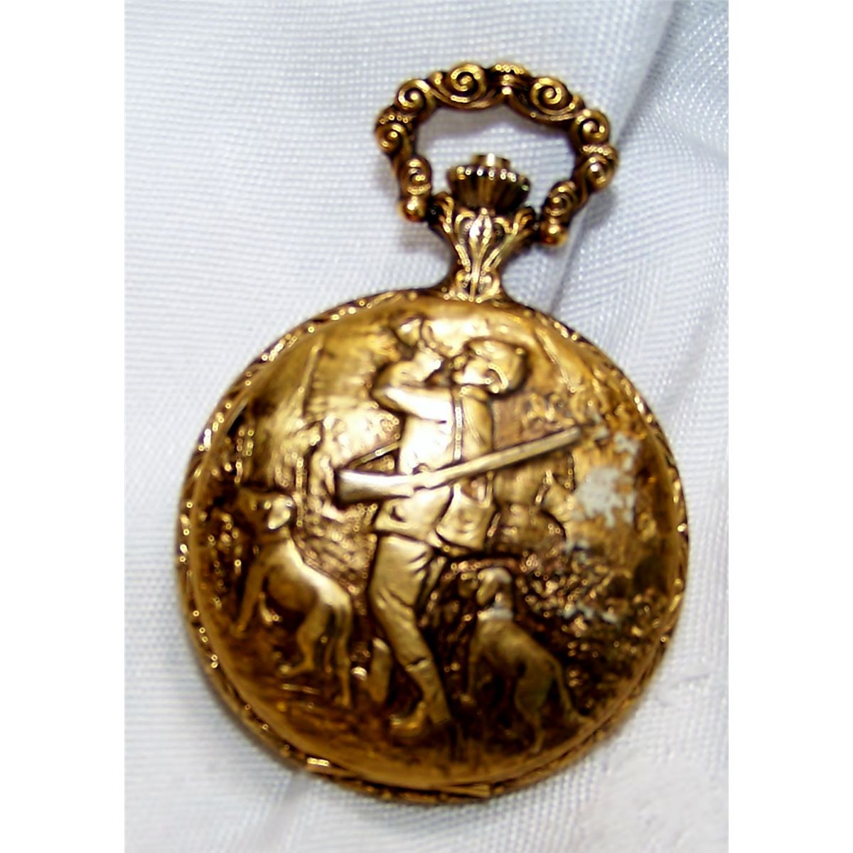 American Heritage 17 Jewel Pocket Watch w/ a Gold Plated Hunting Case.