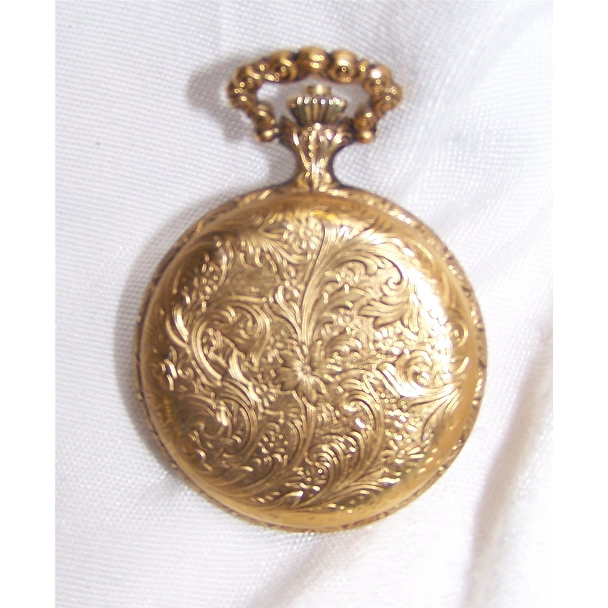 American Heritage 17 Jewel Pocket Watch w/ a Gold Plated Hunting Case.