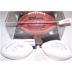Three Signed Footballs.