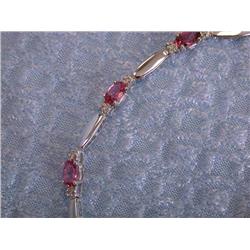 White Gold Bracelet with Diamonds and Topaz