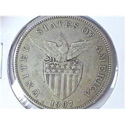 1907-S US/PHILIPINNES PESO SILVER .5144 OZ. ASW