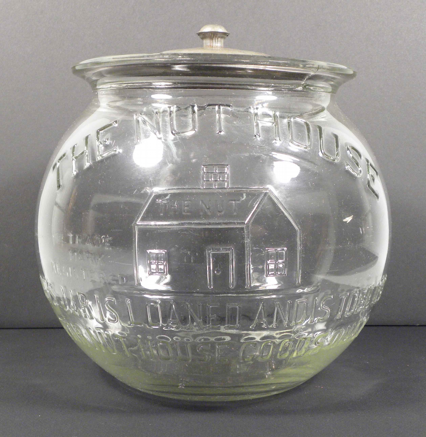 "The Nut House" Embossed Glass Store Jar