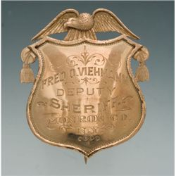 Unique and Finely Engraved Antique Gold Eagle & Shield Pattern Badge for Fred O. Vichmann, Deputy Sh