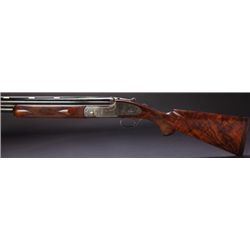 **Cased 12 Gauge Extra Finish Kell Engraved James Purdey Sidelock Over and Under Shotgun with Two Se