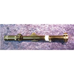 1. Tasco 4 x 15 .22 Cal. Rifle Scope. Used. With mounts.