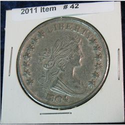 42. Copy of 1804 Draped Bust Dollar.