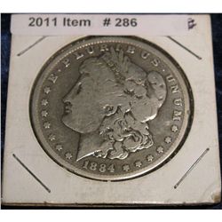 286. 1884 O Morgan Silver Dollar. VG-8.