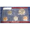 752. 1999 D Cent, Nickel, Dime, & Half Dollar in red cellophane