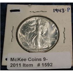 1592. 1943 P Walking Liberty Half. Nearly full thumb MS 65.