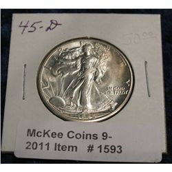 1593. 1945 D Walking Liberty Half. Nearly full thumb MS 63.