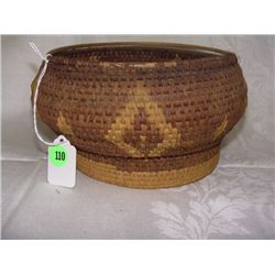 antique handmade Native American basket as seen
