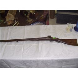 antique double barrel shotgun, as seen
