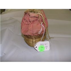 Native American basket with cloth top