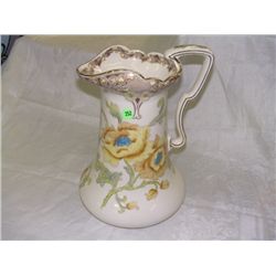 large porcelain floral water pitcher
