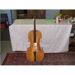 vintage cello with stand, as seen