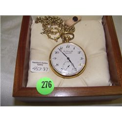 mans gold color pocket watch by Tissot (newer)