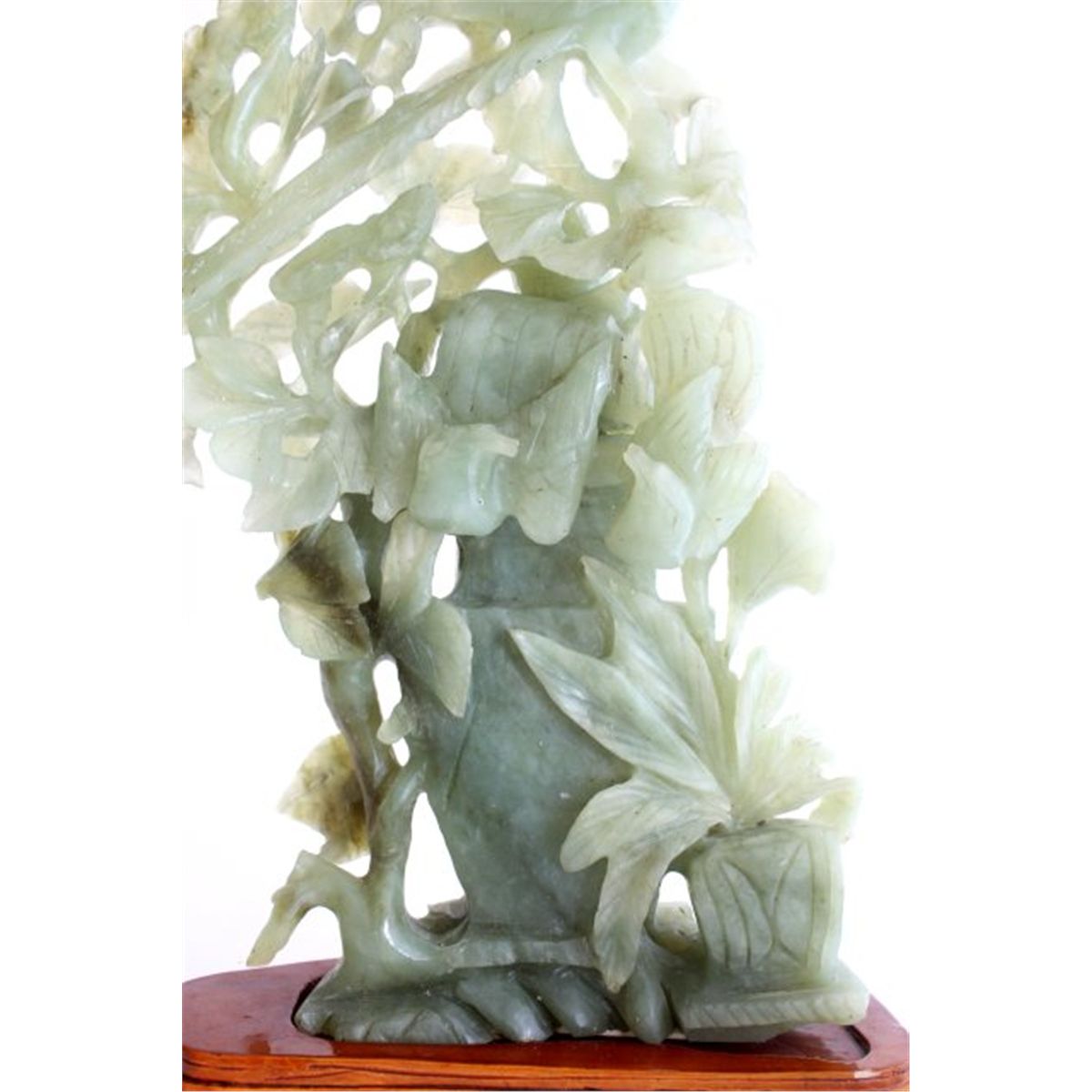 Green jade tree sculpture with birds