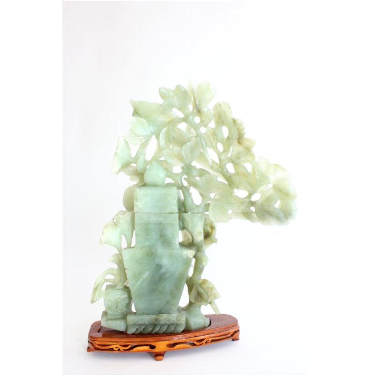 Green jade tree sculpture with birds