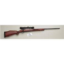 Weatherby bolt-action rifle, .270 magnum  cal., 24” barrel, black finish, checkered  wood stock, sli