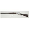 Image 2 : Winchester model 1873 First Model with raised  thumbprint dustcover. 24” round barrel, full  magazin