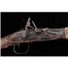 Image 2 : Flintlock musket of trade style cut down to  small carbine in Indian manner with hide  wrap. Measuri
