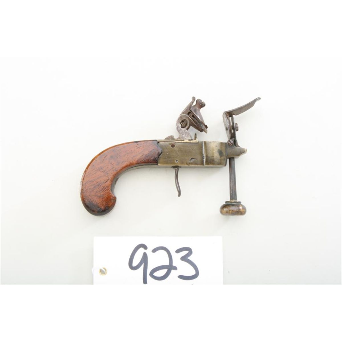 Center hammer flintlock tinderlighter circa 18001820. Cast brass body