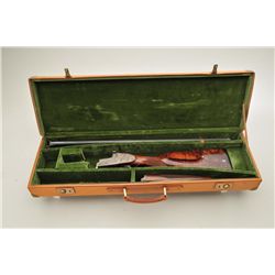 Special Order High-Grade Merkel12ga  over/under shotgun, elaborately engraved with  panels of game s