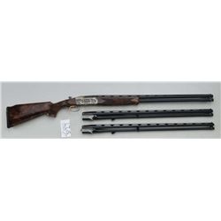 Krieghoff K-20 high-grade (80) over/under  shotgun with three sets of barrels in 20, 28,  and 410 ga