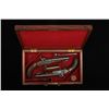Image 1 : Pair of double-barrel percussion officer’s  pistols by Collins of London. Cased with  accessories, c