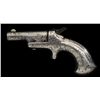 Image 1 : Colt No. 3 derringer, .41 caliber rimfire,  fully and finely silver stocked and signed by  Tiffany &