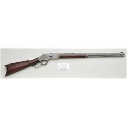Winchester Model 1873 lever action rifle, .44  cal., 24” octagon barrel, wood stocks,  #185534B. Thi