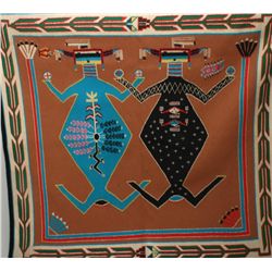Finely woven Navajo rug showing figures of  sand painting at center. Unusual blue, red,  light brown