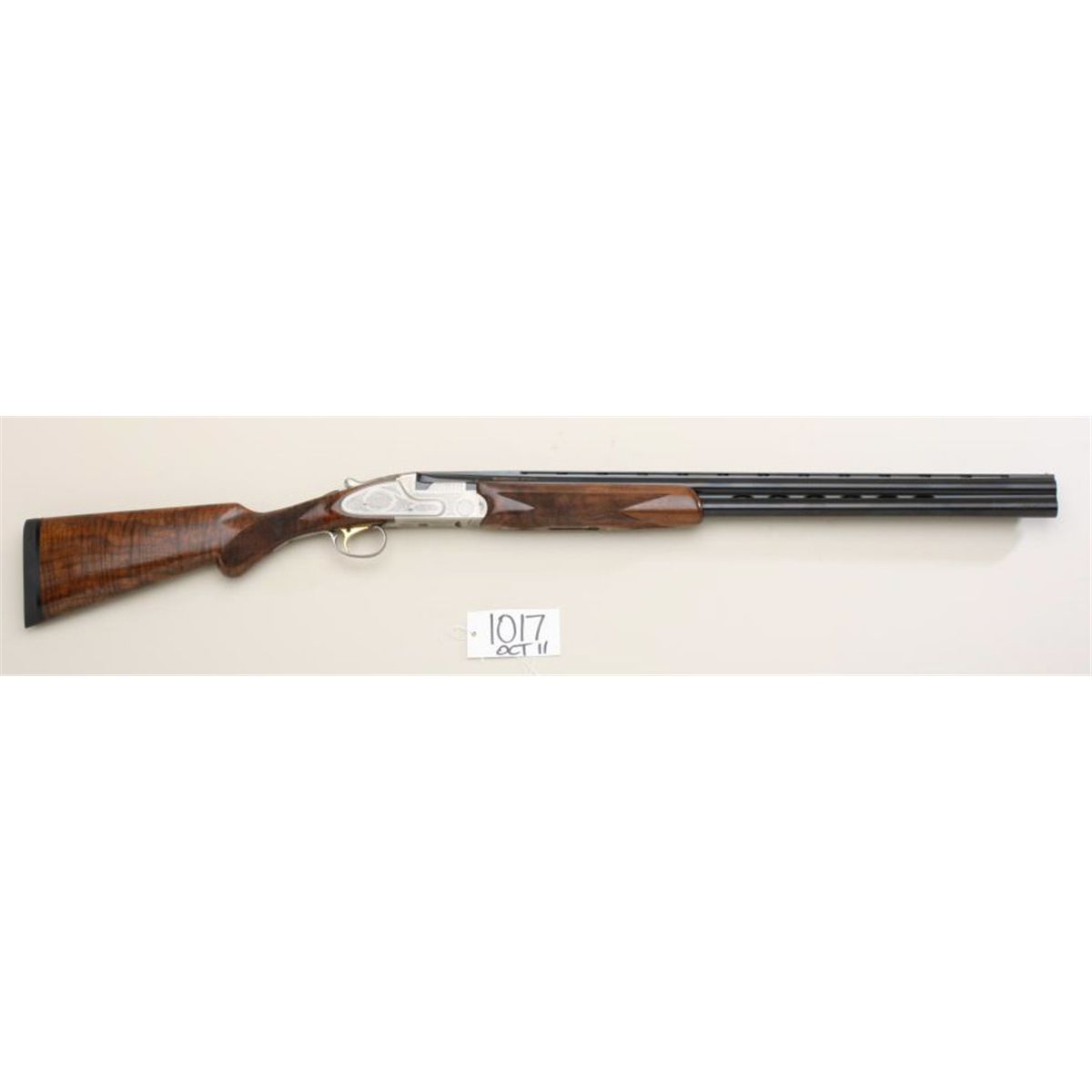 Weatherby Athena V Classic Field, 12ga, 28” over/under shotgun showing ...