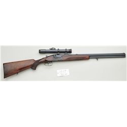 Carl Bock O/U combination rifle, 16 gauge  over 6.5 x 57R mm cal., 24” barrels, blue  finish, engrav