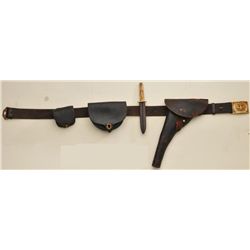 Early US single action holster , belt, dyre  pouch, pistol ammunition pouch, and belt. The  type wor