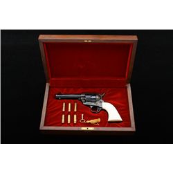 Colt Single Action Army revolver, .45  caliber, 4-3/4” barrel, factory engraved,  blue and case hard